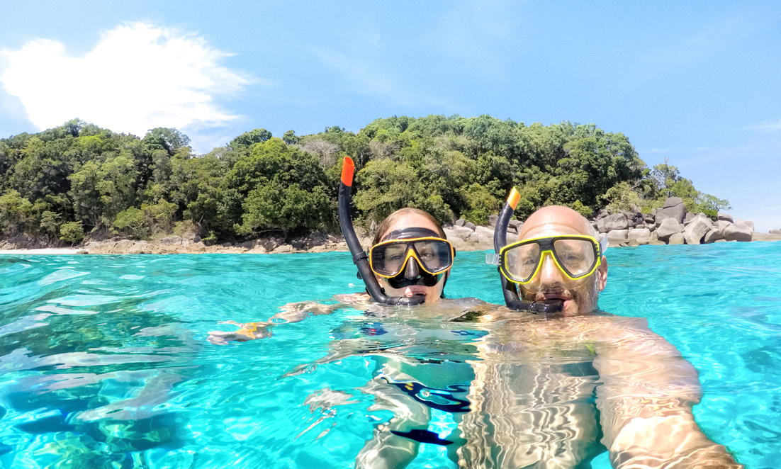 Young Couple Taking Selfie on the Beach